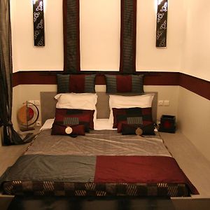 Kamer met een Queen Size Bed